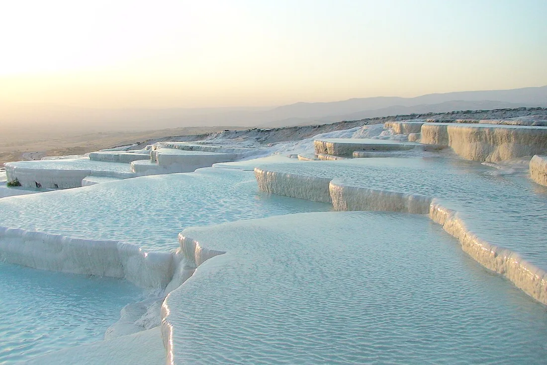Water-filled travertine terraces at Pamukkale, Denizli Province, Türkiye